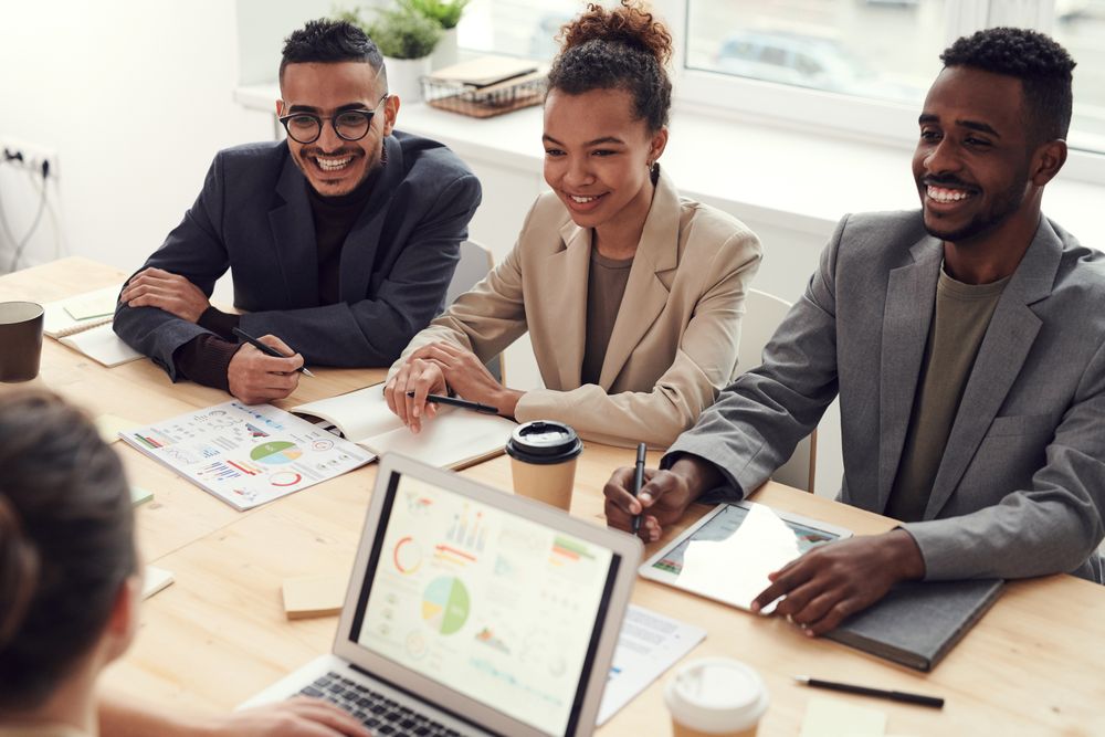 Diverse business team reviewing ERP implementation and systems data