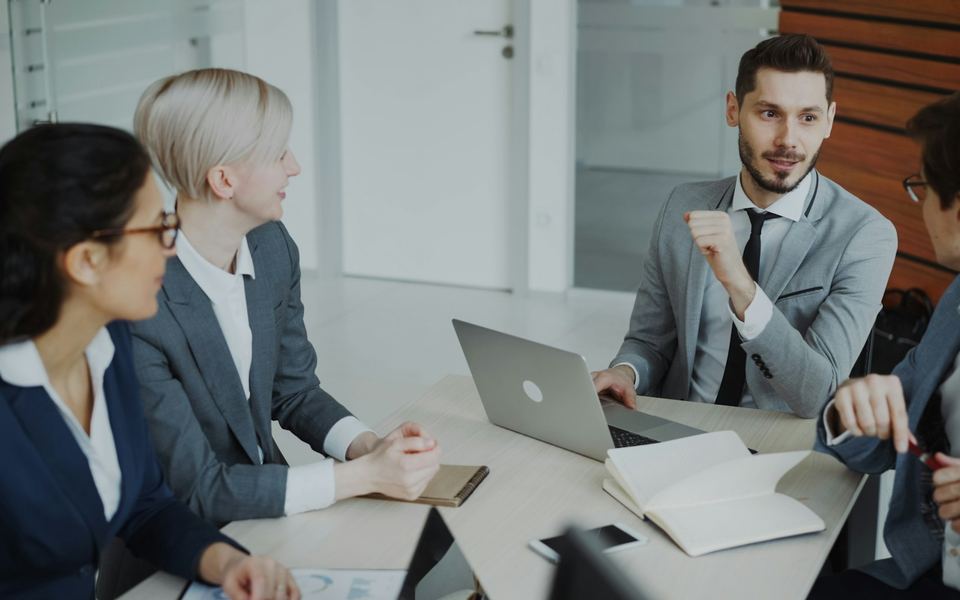 A management team reviewing results together