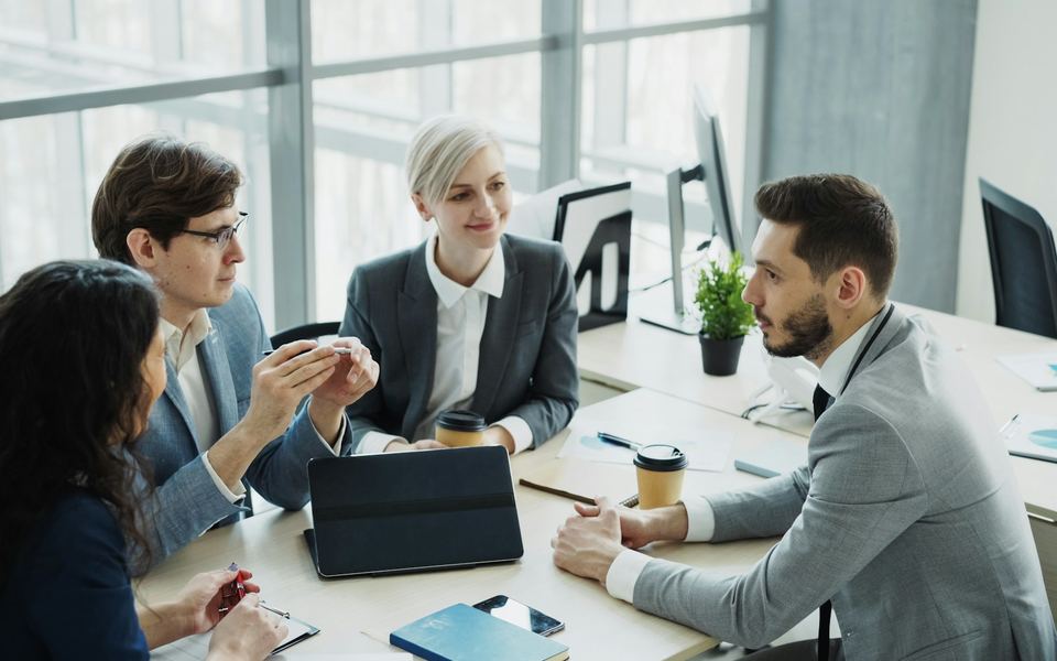 An international team collaborating in a modern office
