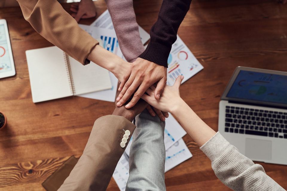 A family business team committing to one plan over the numbers