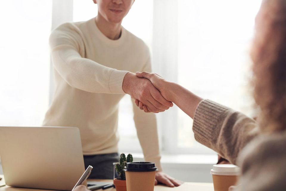A handshake at the start of an engagement